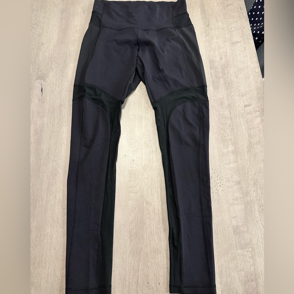 Lulu Lemon yoga leggings with sheer paneling